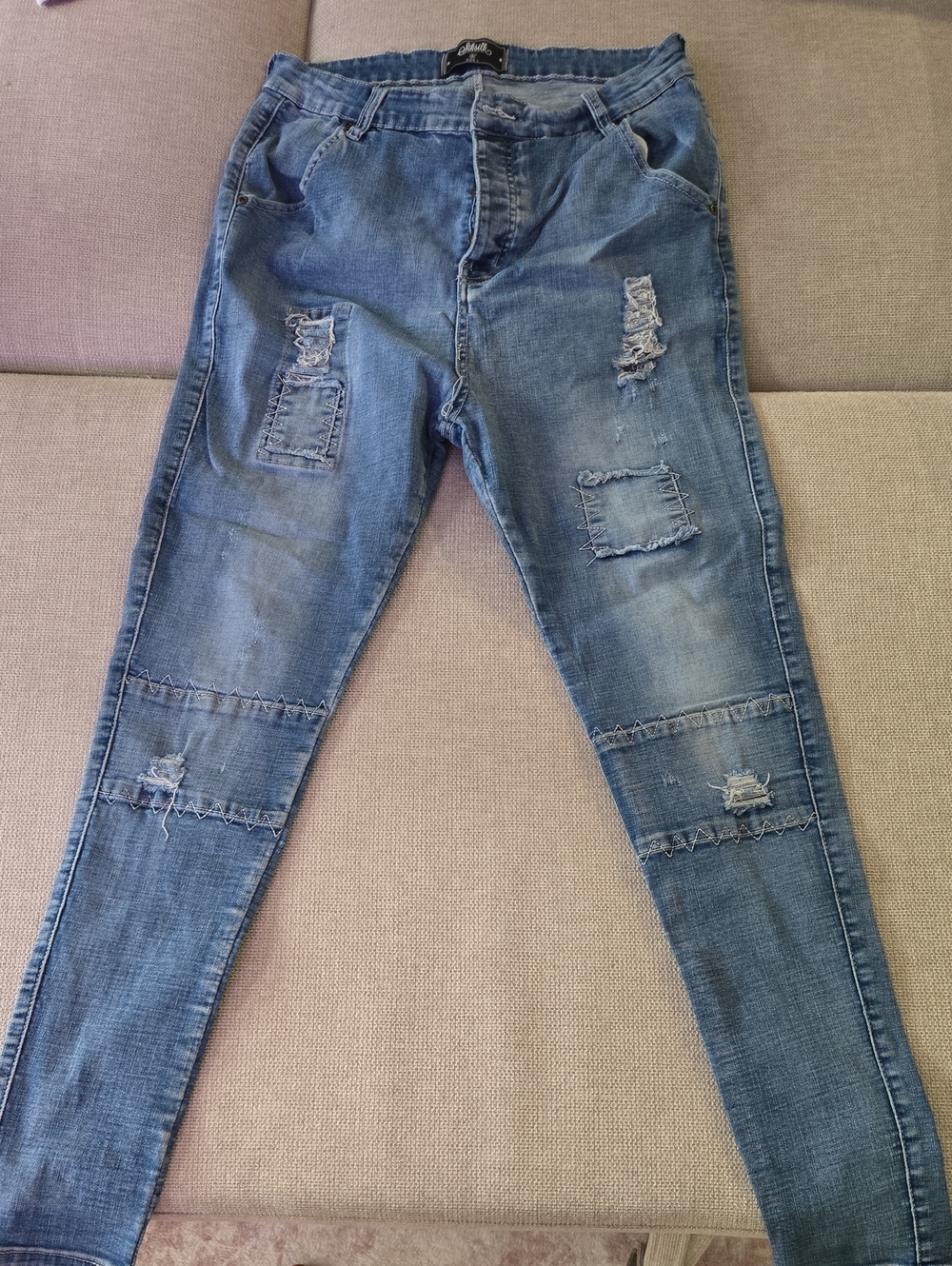 Men's Skinny Distressed Blue Jeans with Patch Detail
